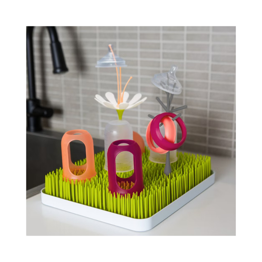 Rejilla de secado. Cesped, ramita y vástago