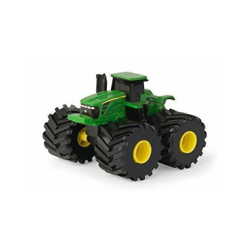 Ruedas monstruosas tractor con cabina cerrada